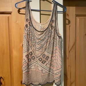 sleeveless beaded shirt size L